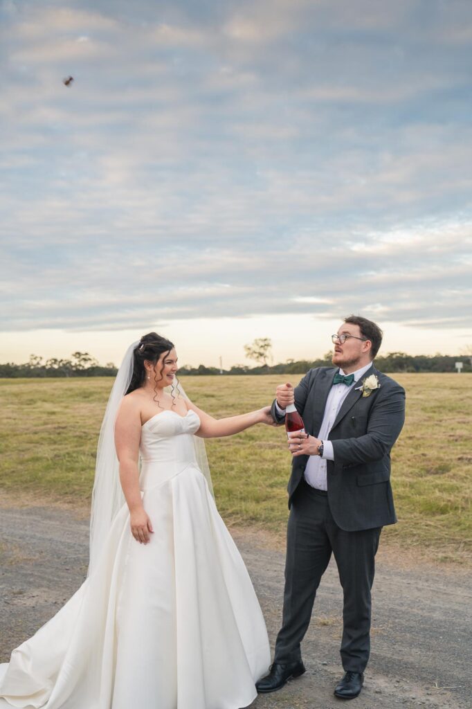 Sirromet wedding photography - pop champagne