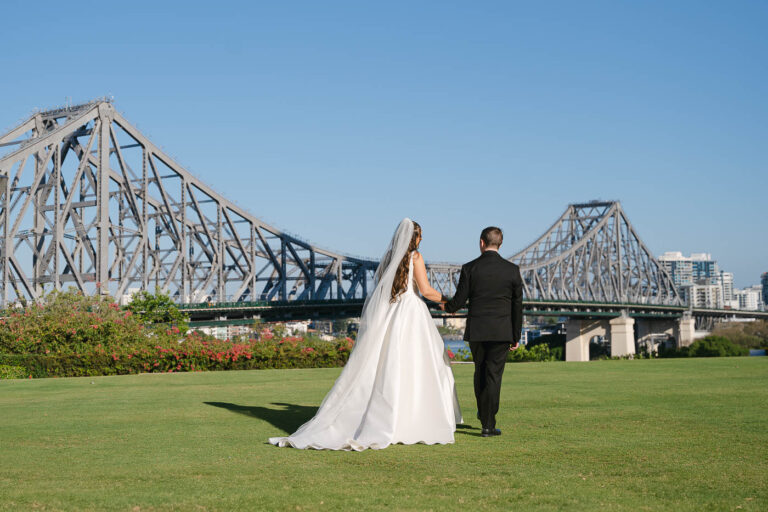 All Hallows Chapel Wedding - Bride & groom and bridge