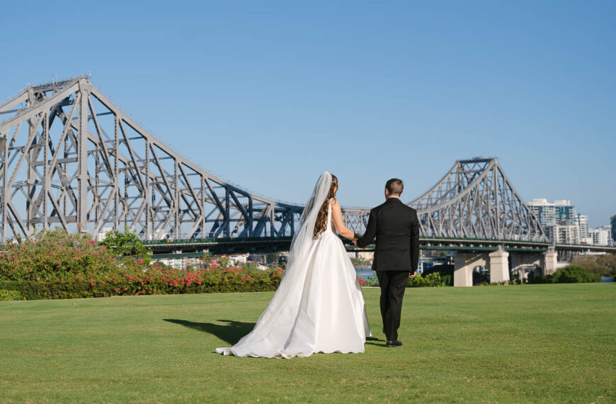 All Hallows Chapel Wedding - Bride & groom and bridge