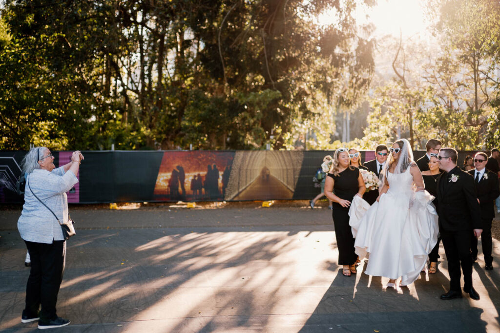 All Hallows Chapel Wedding - Bride & groom candid