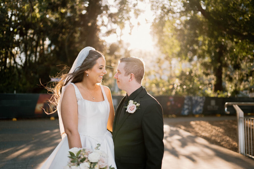 All Hallows Chapel Wedding - Bride & groom love