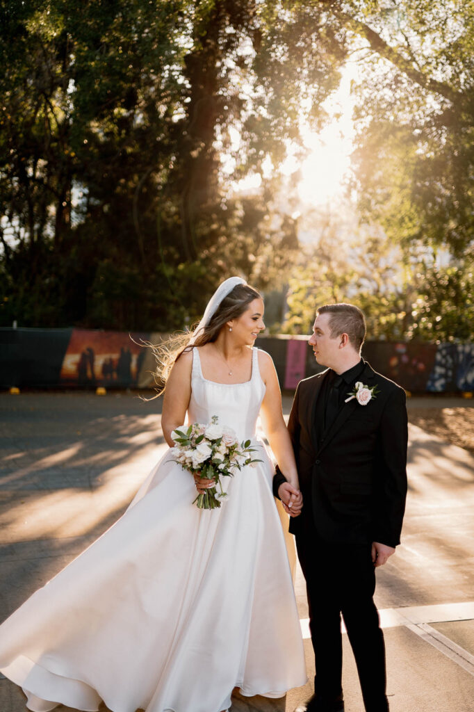 All Hallows Chapel Wedding - Bride & groom smile