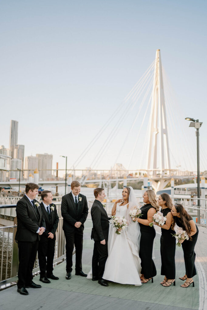 All Hallows Chapel Wedding - Bride & groom laugh