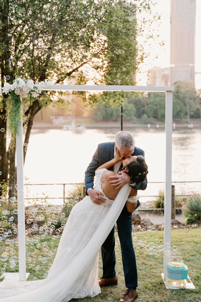 Riverlife wedding photographer - ceremony kiss